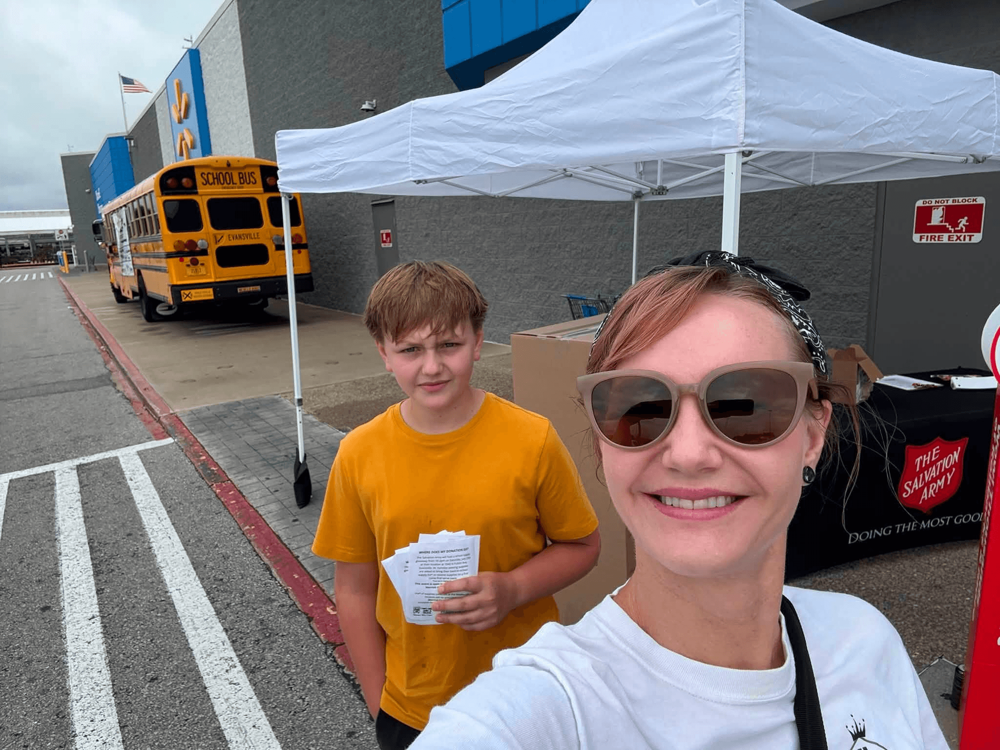 Volunteering with Elijah at a community donation drive